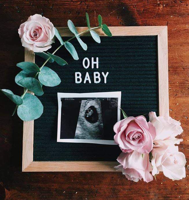 Board with "Oh baby" text